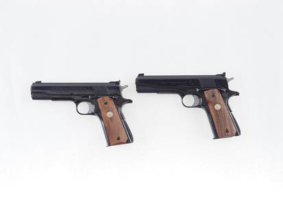 A Pair of Colt Custom Shop 1911 Semi-Automatic Pistols: What a pair! A Colt Gold Cup National Match, s.n 2979-M2, .45 ACP, with Elliason adjustable rear sight, jeweled trigger and hammer, figured checkered walnut grips with gold Colt medallions &amp; (1) C