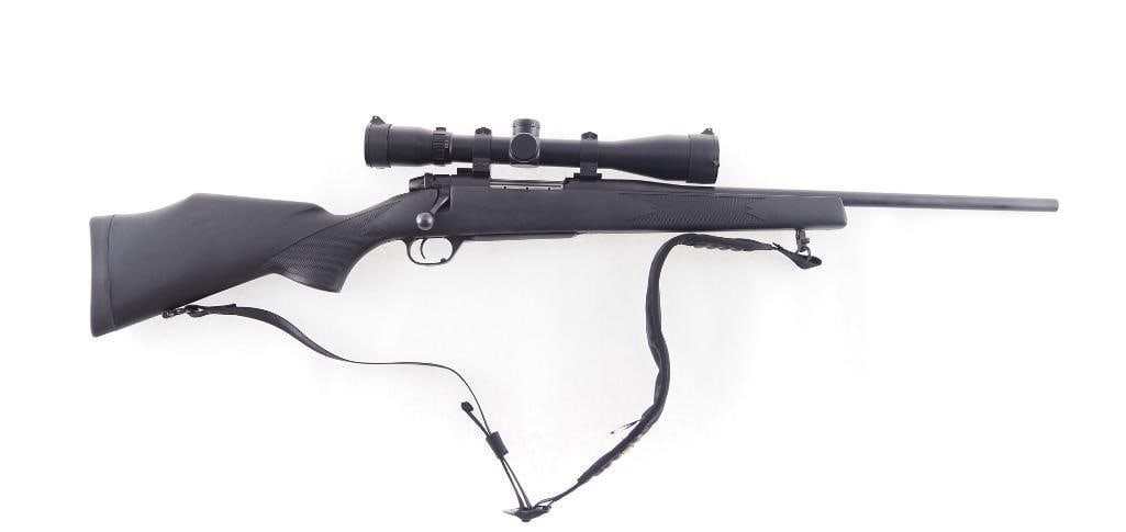 Weatherby Mark V Bolt Action Rifle: s.n. AB004763, .243 Winchester, in excellent condition with 20" barrel, synthetic stock and Burris 2.5-16X42 scope. Modern (25-0286)