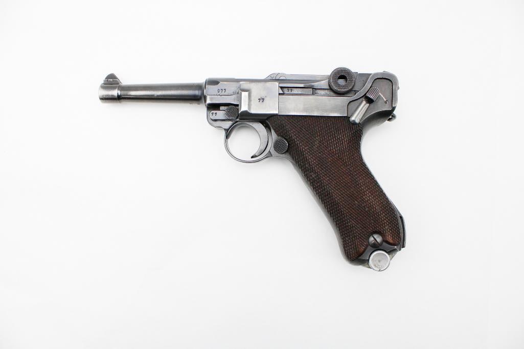 Mauser Luger P-80 Semi-Automatic Pistol: s.n. 977, 9mm, 3.75" barrel. A matching numbers pistol, but for the magazines. WWII German acceptance marks, includes a period leather holster also with acceptance marks, (2) period magazines and take