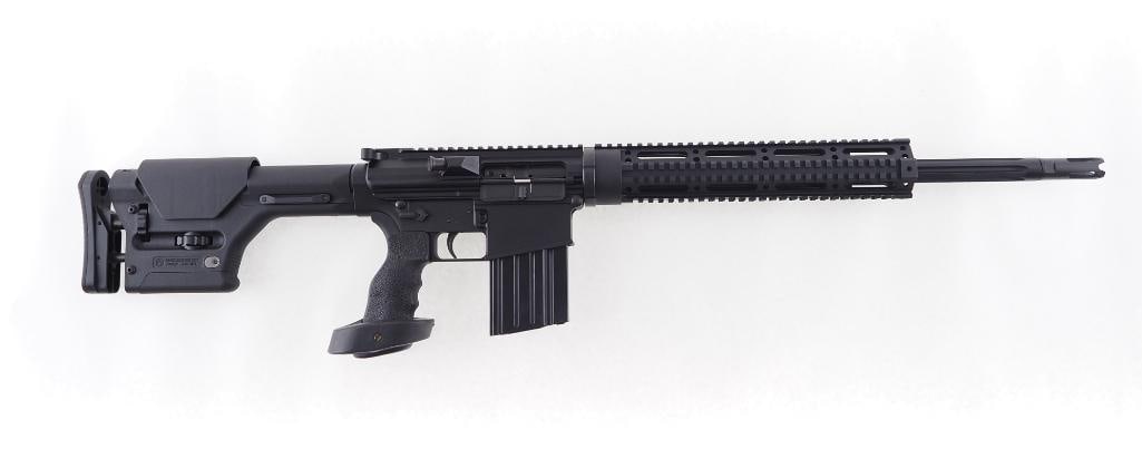 DPMS Model LR-308 Semi-Automatic Rifle: s.n. 120159, .308 Winchester, 18" fluted barrel with muzzle device, Magpul adjustable stock, quad rail forend. In excellent condition with (1) magazine and a hard case. Modern (25-0118)