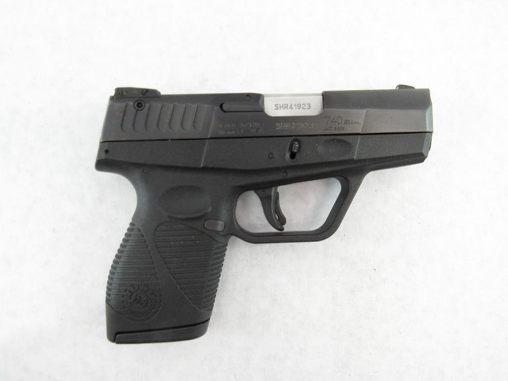 Taurus Model 740 Slim Semi-Automatic Pistol: s.n. SHR41923, .40 S&W, with (1) 6 round magazine. Very good to excellent overall condition in the factory box. Modern (25-0212)