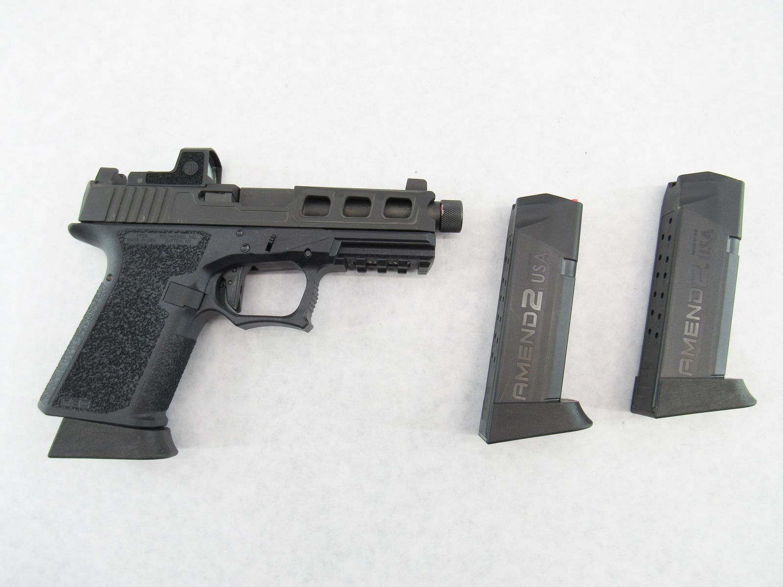 Polymer 80 Model PFC9 Semi-Automatic Pistol: s.n. CA35134, 9mm, with threaded barrel, (3) 15 round magazines and Sig Romeo Zero reflex sight. Good to very good overall condition. Modern (25-0310)