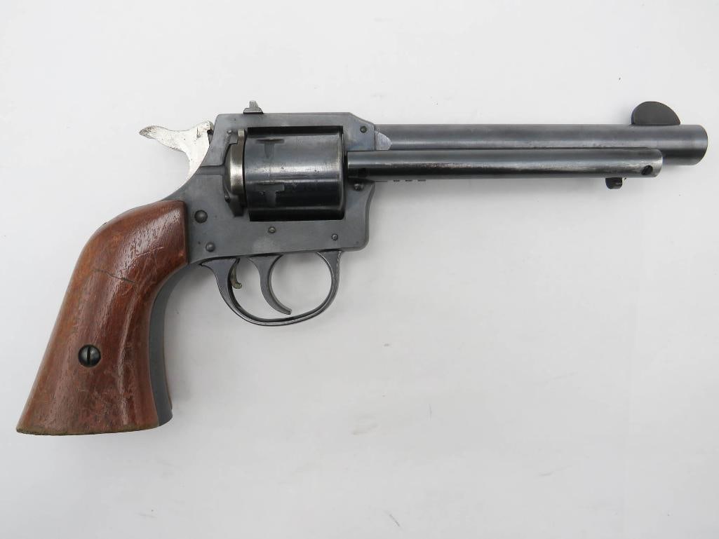 Harrington & Richardson Model 649 Double Action Revolver: s.n. AR14883, .22 LR, with .22 Magnum cylinder & 5.5" barrel. Overall good with light wear to the ejector rod tube, cylinders and grips. Modern (25-0171)