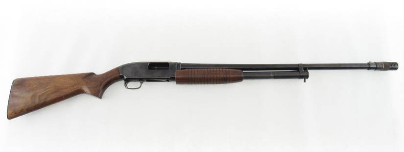 Winchester Model 12 Slide Action Shotgun: s.n. 1734028, 12 Ga., 25" plain barrel with poly-choke, 2.75" chamber. Very good blue, the stock showing wear to the finish. Ca. 1959. C&amp;R (25-0297)