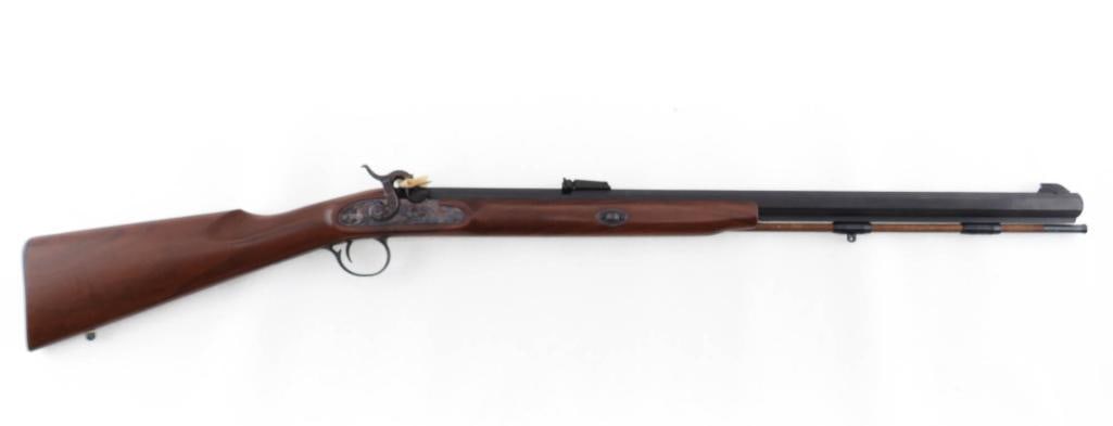 Thompson/Center Renegade Percussion Rifle: s.n. 369558, .54 Cal., with 27" octagon barrel and adjustable rear sight. Overall very good condition with slight wear to the finish on the barrel tang and a few dings on the stock. Exempt