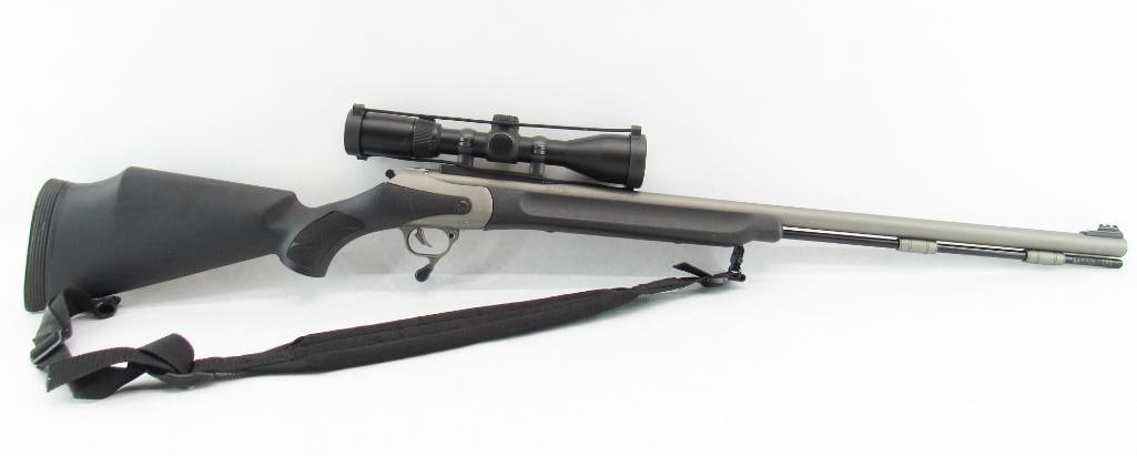 Thompson/Center Triumph Inline Muzzleloading Rifle: s.n. 48866, .50 Cal., with 28" round barrel, synthetic stock and Nikon Omega 3-9X scope. In very good overall condition. Exempt