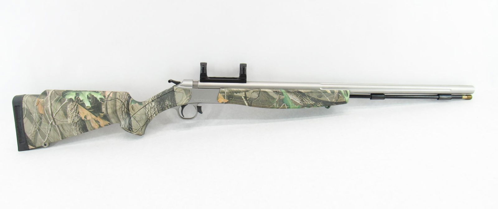 Connecticut Valley Arms Optima Inline Muzzleloading Rifle: s.n. 61-13-061148-12, .50 Cal., with 26" fluted stainless steel barrel, synthetic camo stock and 1" scope rings. Overall excellent condition. Exempt