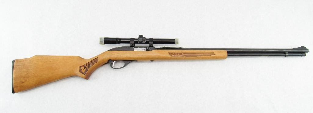 Marlin Glenfield 60 Semi-Automatic Rifle: s.n. 19323438, .22 LR, with Tasco 4X15 scope. In fair condition with wear to the receiver finish and spotty light rust on the barrel. Modern (25-0435)