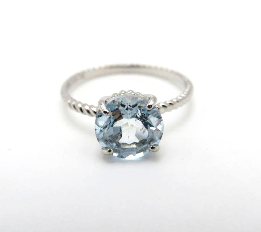 10K White Gold and Aquamarine Ring: 8mm round cut aquamarine, size 6, 1.4 grams total weight