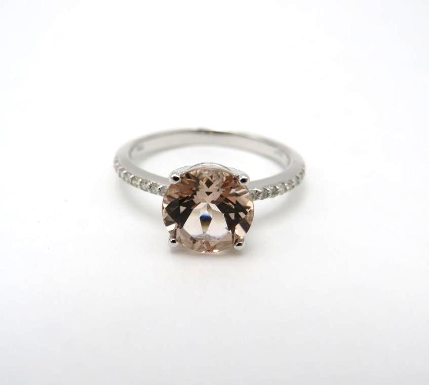 14K White Gold and Tourmaline Ring: 8mm round cut tourmaline with (16) 1mm +/- white sapphires on the shoulders, size 6, 2.29 grams total weight