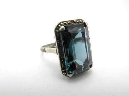 Victorian .800 Silver and Gahnospinel Spinel Ring: 18.7mm x 12.3mm +/- spinel, surrounded with faceted paste stones (a few absent from the setting), size 6.25, 7.63 grams total weight