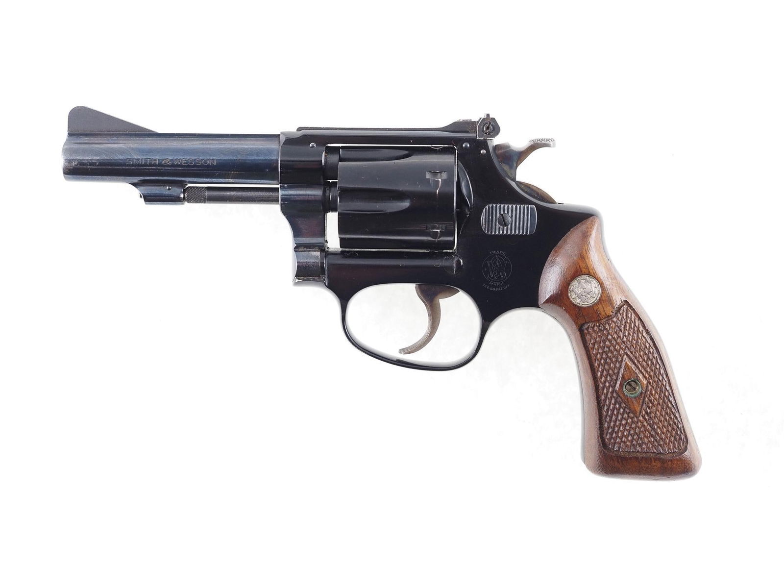 Smith & Wesson Model 22/32 Kit Gun Double Action Revolver: s.n. 14816, .22 LR, 3.5" barrel, adjustable rear sight, with leather holster. Grip serial number is 14817. C&R (25-0484)