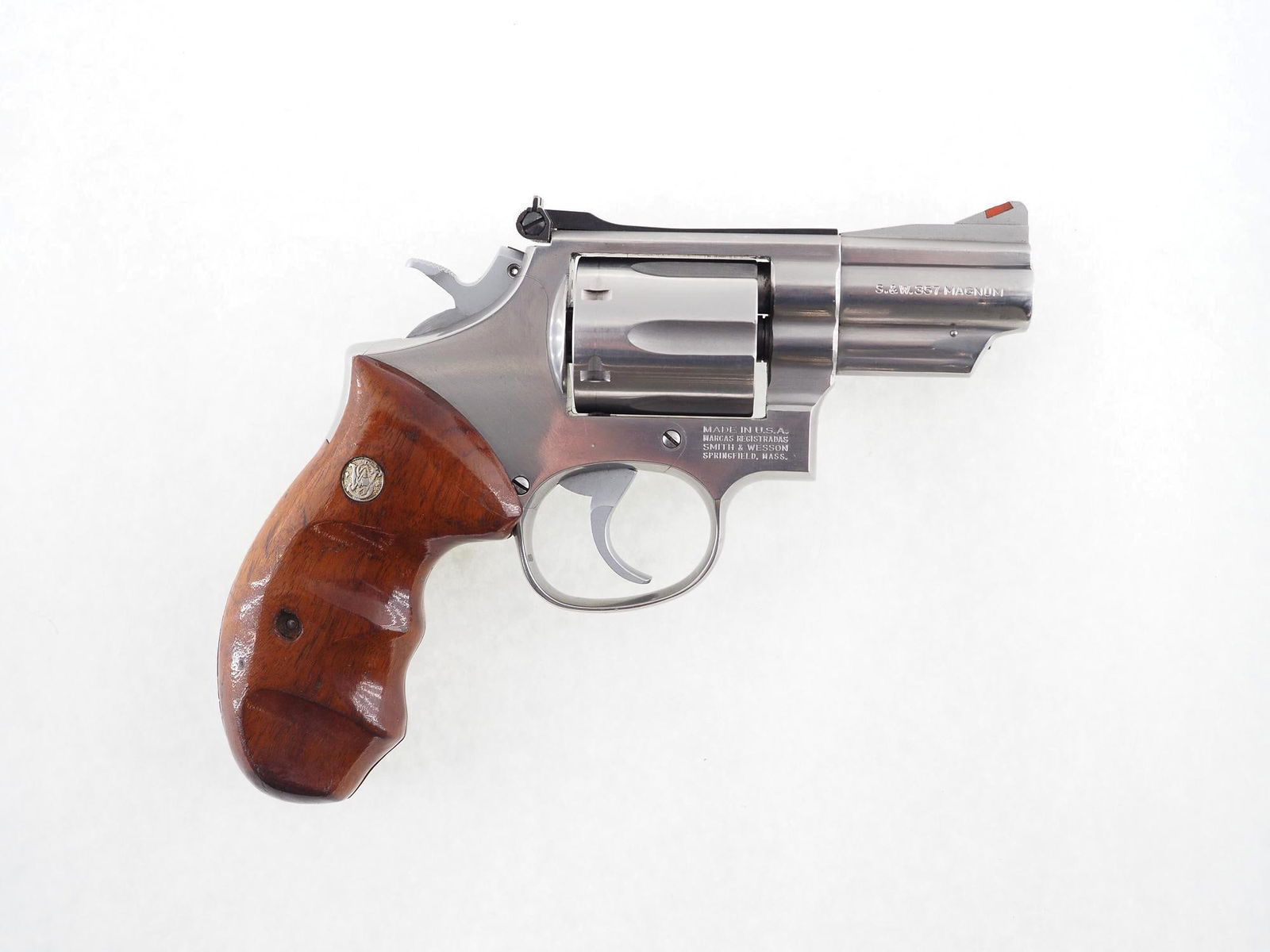 Smith & Wesson Model 66-2 Double Action Revolver: s.n. ABJ5474, .357 Mag. 2.5" barrel, with adjustable rear sight and red ramp front sight. With S&W combat grips and original S&W grips, in soft case. Modern (25-0525)