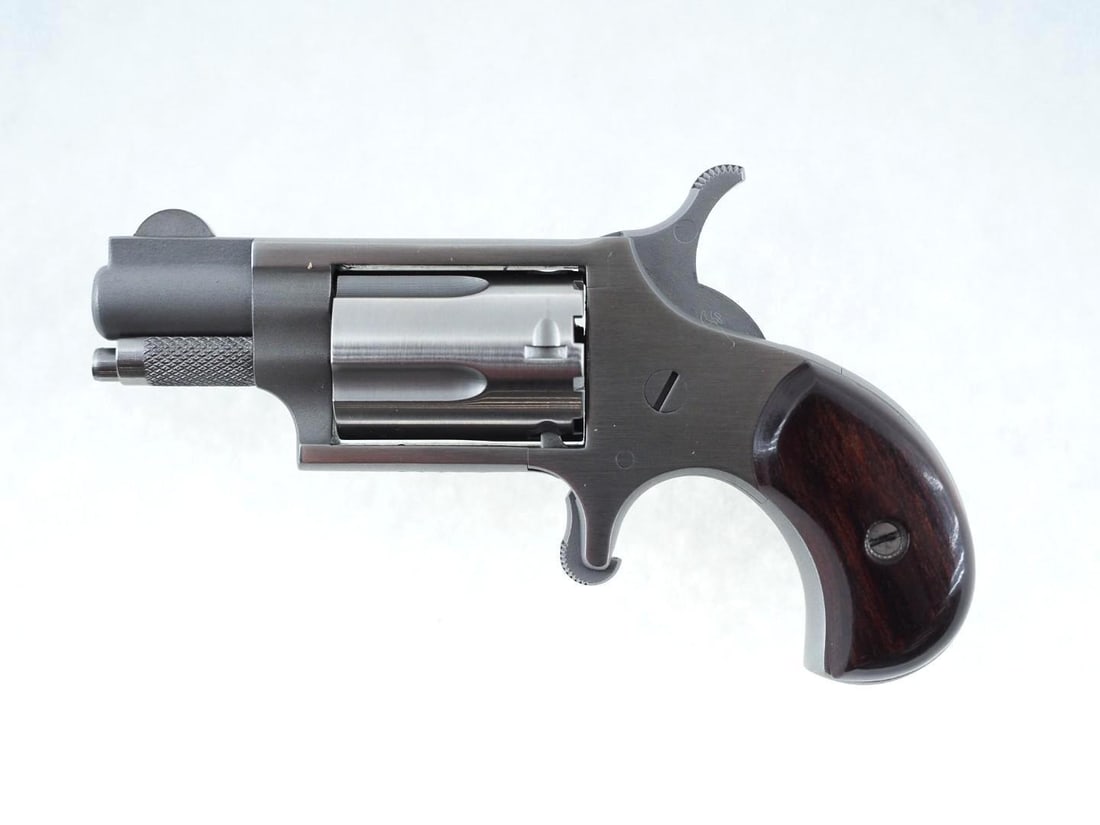 North American Arms Model NAA-22LR Single Action Revolver: s.n.V69349, .22 LR, 1" barrel, stainless, leather holster and soft case, in original box, front sight blade slightly bent. Modern (25-0613)
