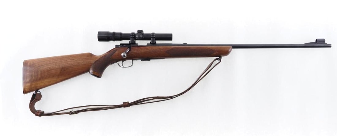 Winchester Model 75 Sporter Bolt Action Rifle: s.n. 71110, .22 LR, 24" barrel, original front sight, rear sight has been removed, Weaver 1.5-4.5x scope, with (1) factory magazine, sling swivels and leather sling. Mfg. ca. 1950 C&R (25-0517)
