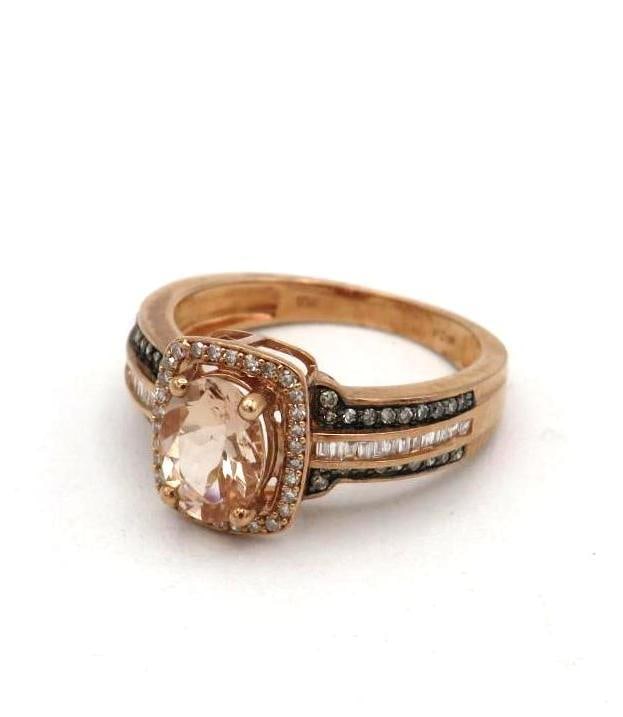 10K Rose Gold and Tourmaline Ring: 8mm x 6mm oval cut tourmaline with (90) 1mm +/- white sapphires surrounding and on the shoulders, size 6, 3.11 grams total weight