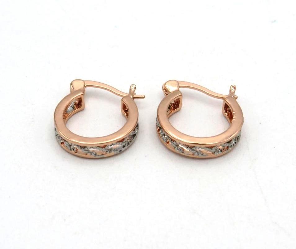 Pair of 18K Rose & White Gold Earrings: 15mm in diameter, 2.5 grams