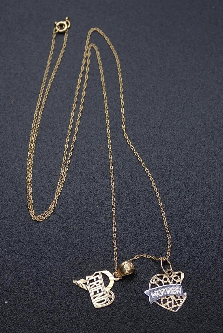 14K Yellow Gold Necklace and Pendants: 18" in length, 1.2 grams