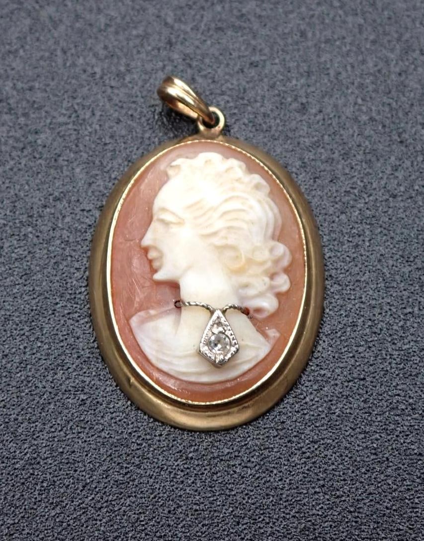 Antique Cameo Pendant in Gold Bezel: with a small diamond, 22mm in length