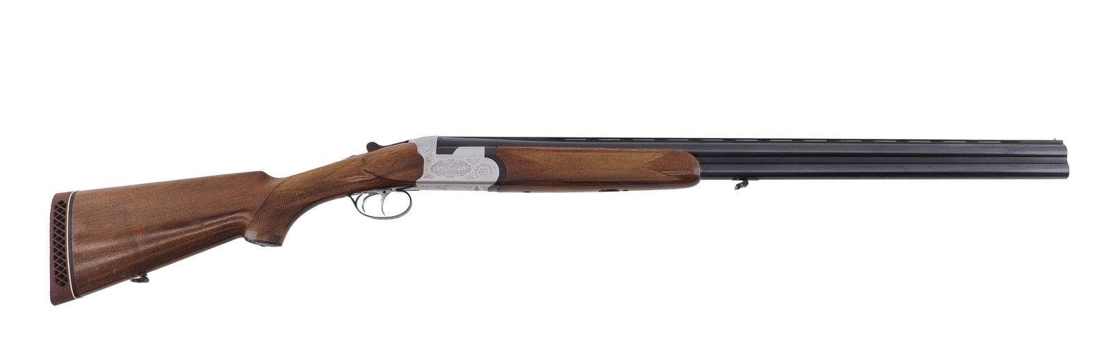 Sauer-Beretta Model S56E Over-Under Shotgun: s.n. 47864, 12 Ga., 28" vented rib barrels, 3" chambers, choked F&M. Gun is equipped with sling swivels and has engraved receiver. Wood very good with just a couple of small imperfections. Bright