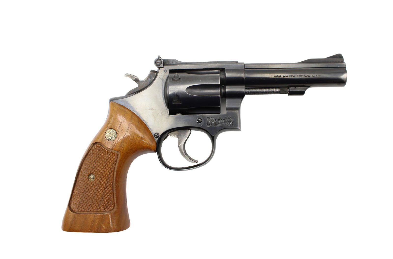 Smith & Wesson Model 17-5 Double Action Revolver: s.n. AJZ0534, .22 LR, 4" barrel with adjustable rear sight. Has target trigger, hammer, and grips.Slight wear at muzzle and face of cylinder from being carried in a holster. Nice clean gun. Modern (25