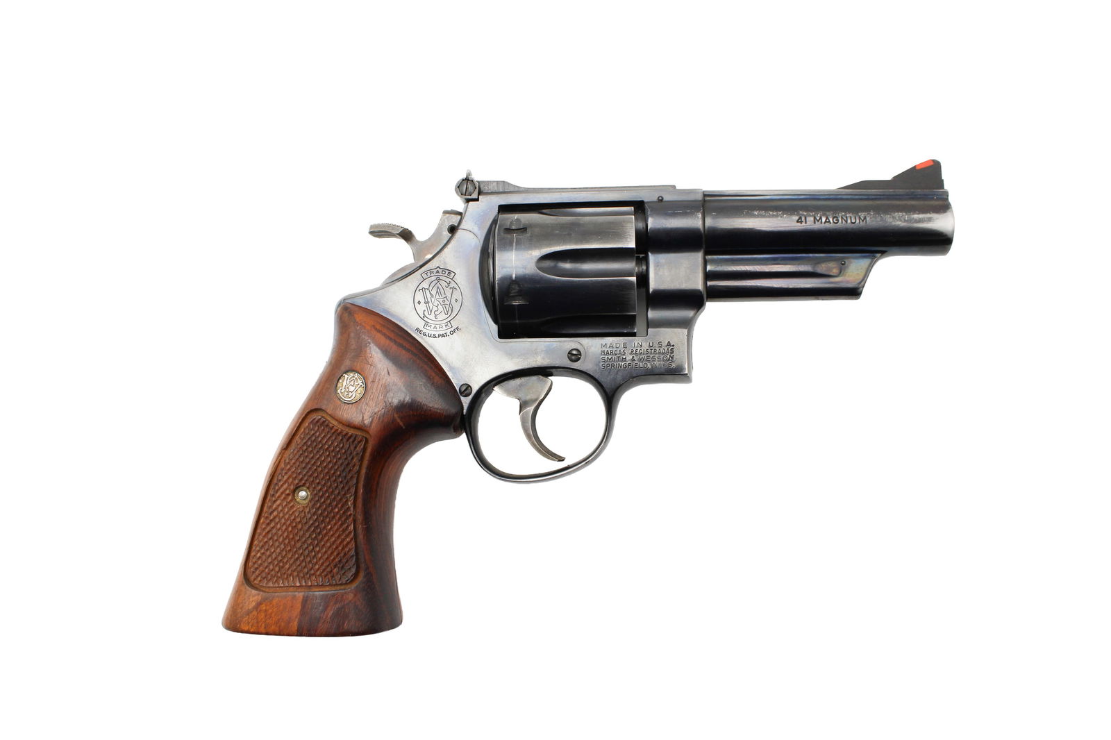 Smith & Wesson Model 57 Double Action Revolver: s.n. N836398, .41 Mag. 4" barrel with white outline rear sight and red ramp front; target trigger, hammer, and grips. some holster wear, otherwise a nice clean gun. Modern (25-0664) 