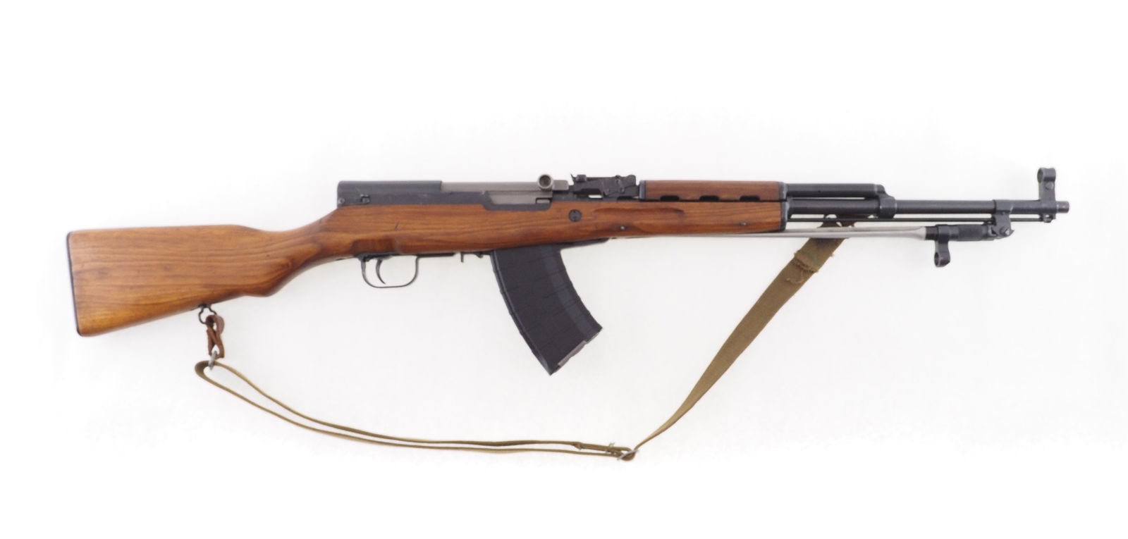norinco Model SKS Semi Automatic Rifle: s.n. 11563696K, .762x39, 20" barrel, original sights, bayonet, sling, (1) magazine (resrictions) and a bag of accessory items. Modern (25-0671) 