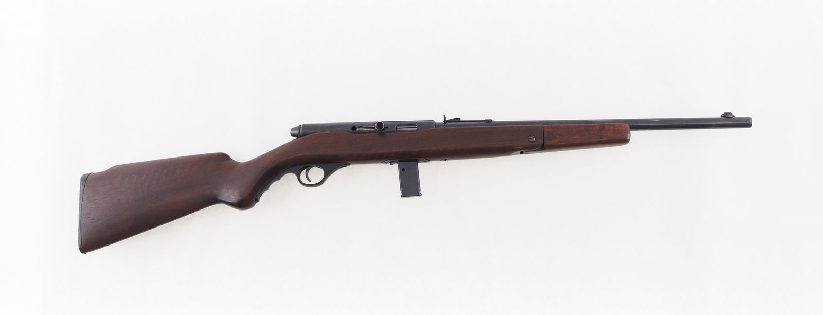 Mossberg Model 152 Semi Automatic Rifle: no s.n., .22 LR, 18" barrel, with (1) magazine. Nice old gun in well cared for condition with a few little freckles. C&R (26-0002)