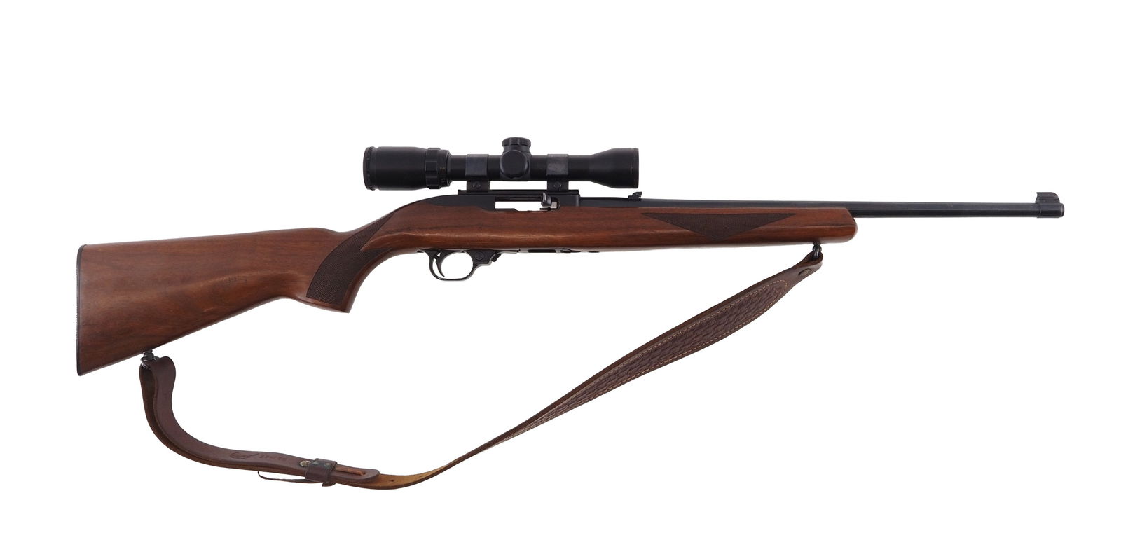 Ruger 10/22 Semi Automatic Rifle: s.n. 120-94821, 22 LR, 18" barrel with original sights, and a Bushnell Banner 1.5-4.5x30 wide angle scope, checkered walnut stock with a leather sling and (1) factory magazine. Modern (25-0658)