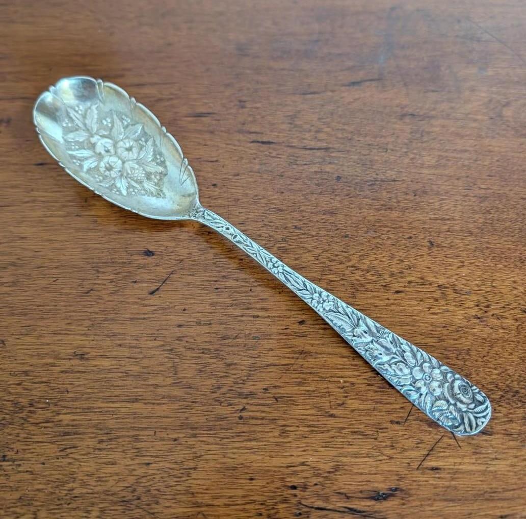 J. Stuart MacDonald Sterling Silver Repousse Berry Spoon: 8.75" in length; 50.9 grams 