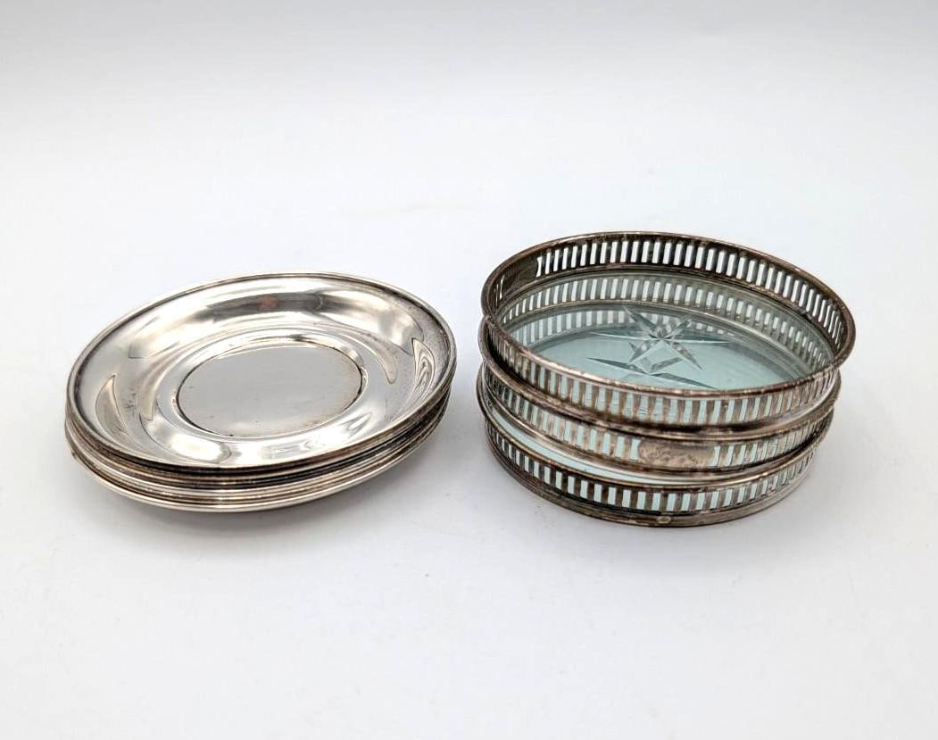 Sterling Silver Lot: (6) Webster plates, 3.5" in diameter, 116.4 grams & (3) coasters with glass bottoms (one is cracked) 