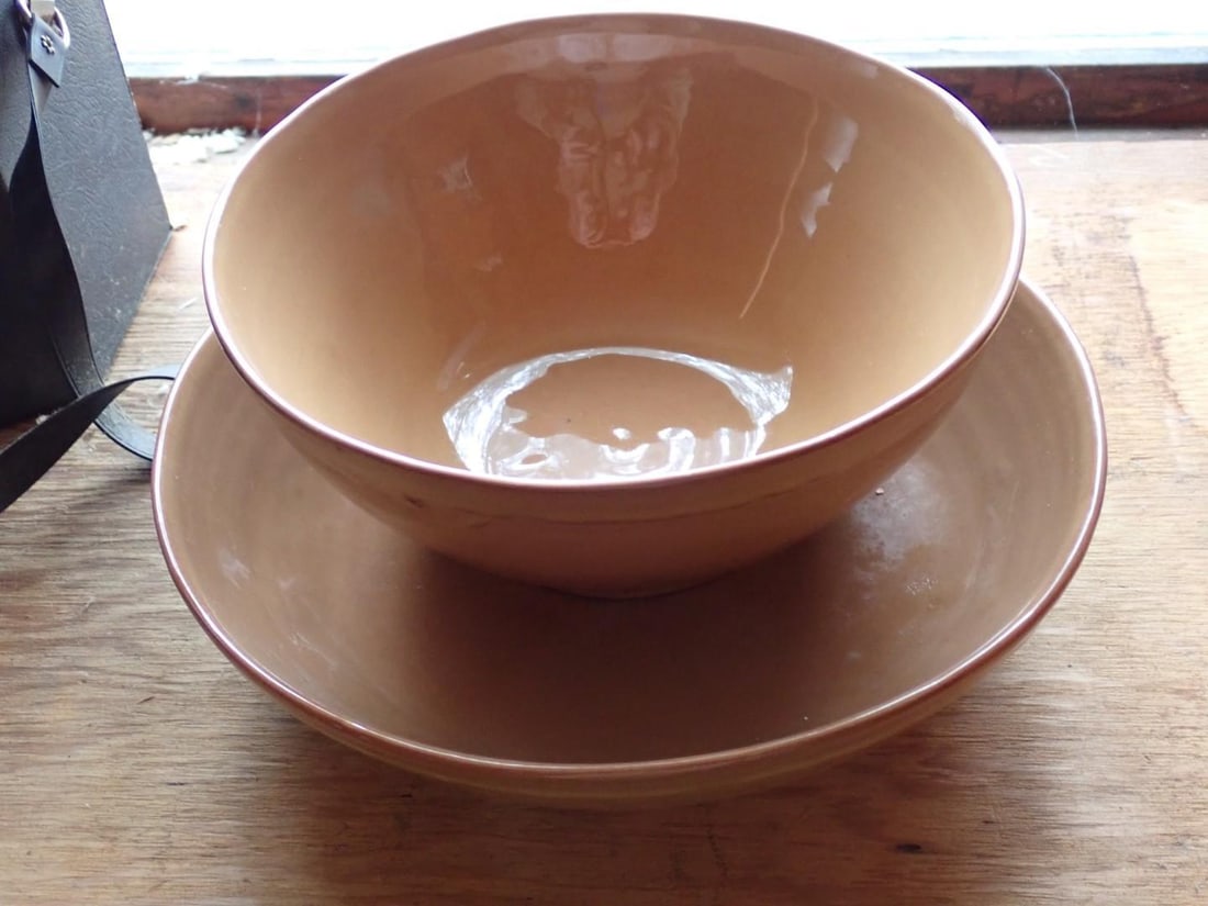 (2) Simon Pearce Earthenware Bowls: (1) 9" dia x 4"; (1) 11" x 2.5" 