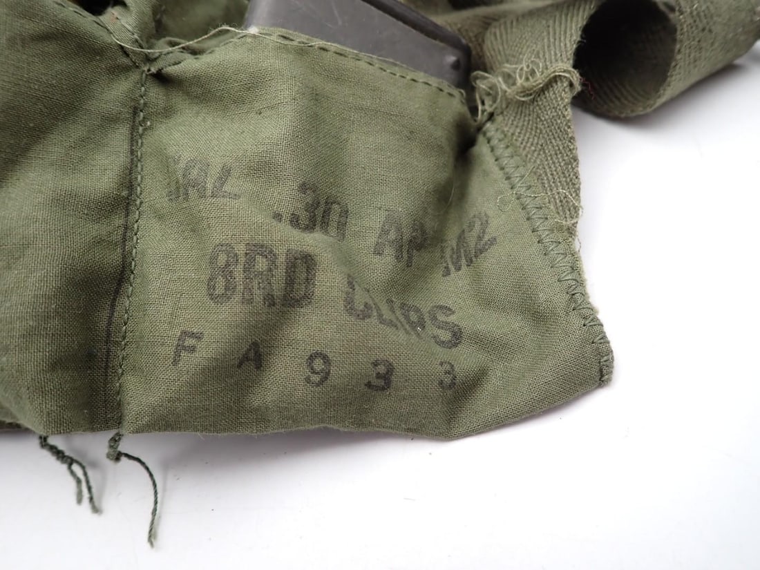 (56+/-) .30 Cal. Cartridges, (24+/-) .30 Cal Brass, (2) Bandoliers - 2