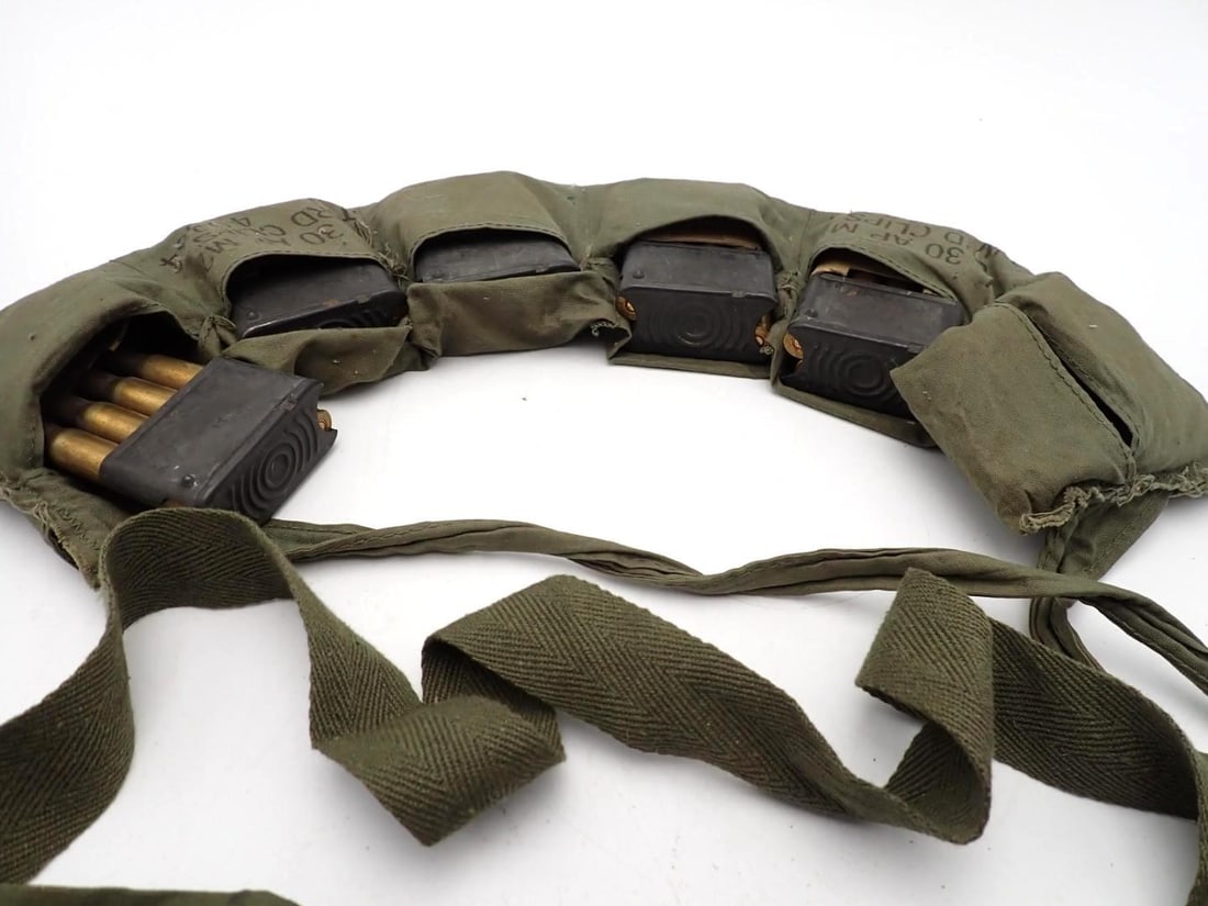 (56+/-) .30 Cal. Cartridges, (24+/-) .30 Cal Brass, (2) Bandoliers - 3