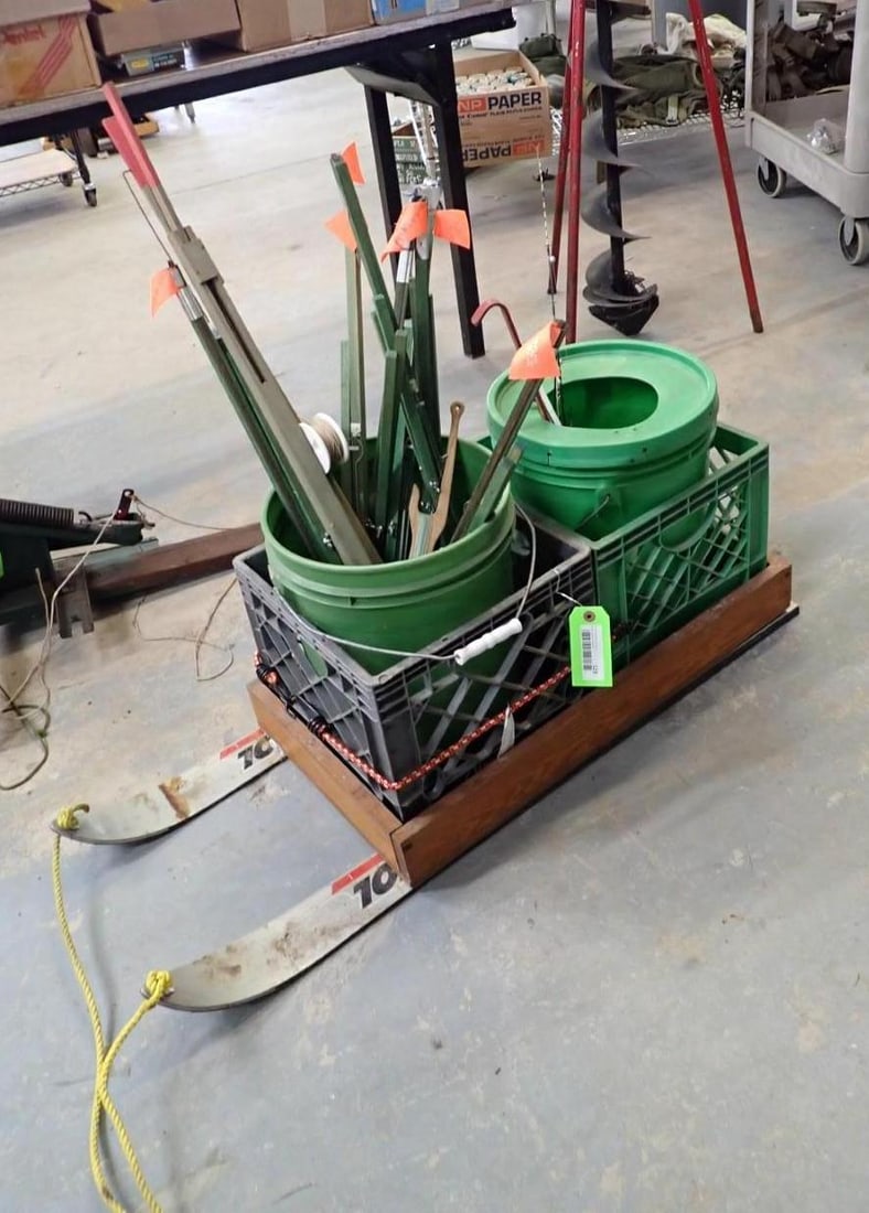 Ice Fishing Lot: (3) rods, (9+/-) tip ups, homemade sled with milk crates