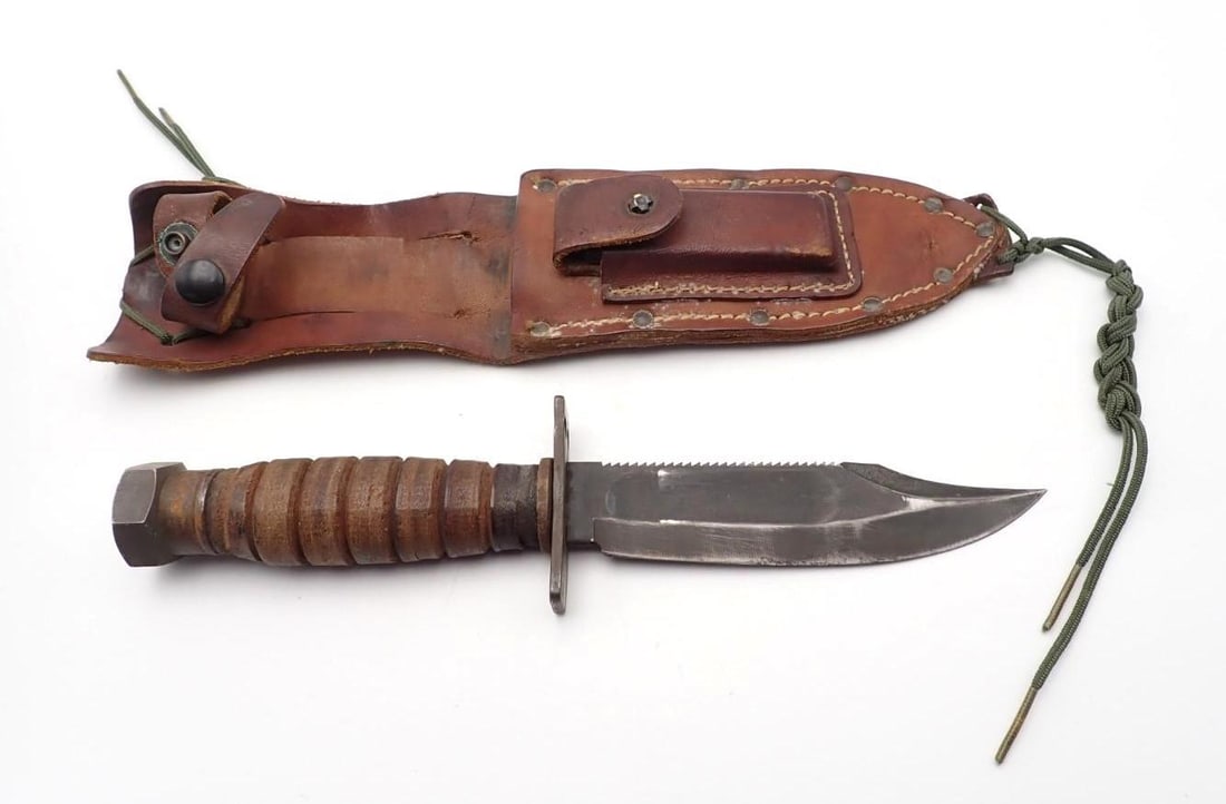 Camillus U.S. Navy Air Force Survival Knife: with leather sheath, Vietnam era, dated 2-1972 on the side of the butt