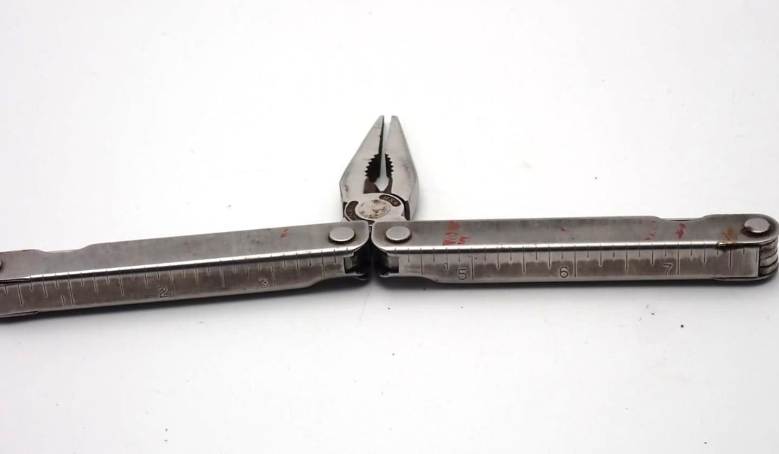 (2) Swiss Army Pen Knives & (1) Leatherman Tool - 10
