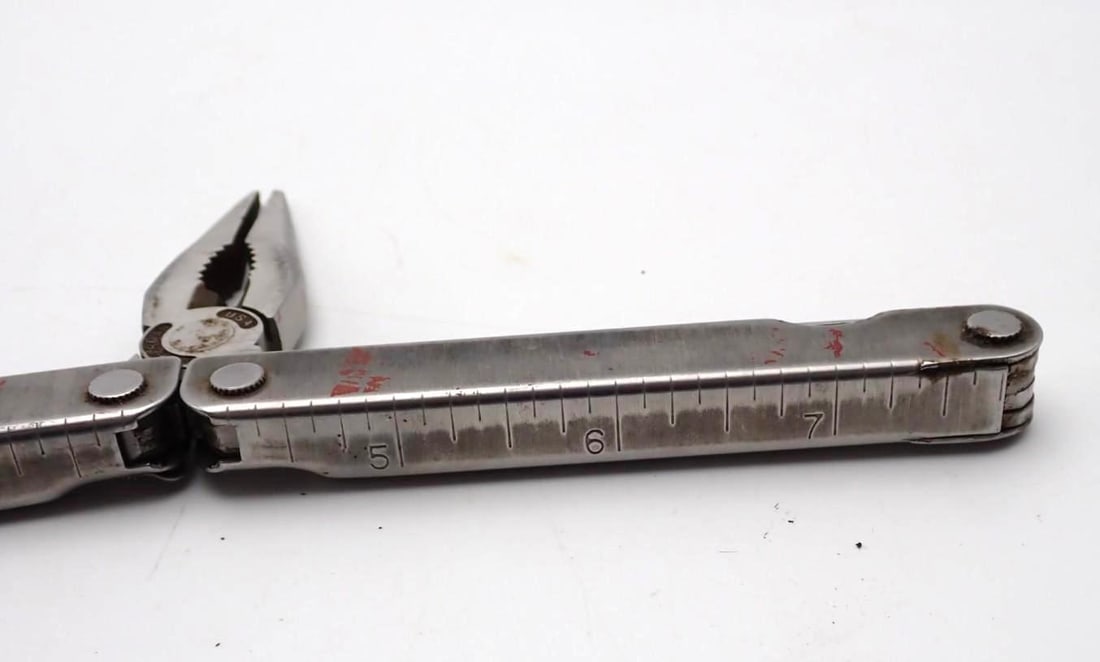 (2) Swiss Army Pen Knives & (1) Leatherman Tool - 12