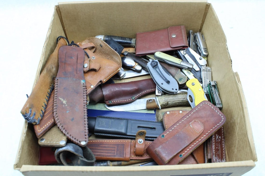 Knife Lot: (7) fixed, makers incl.: Smith & Wesson, Buck, Case, Western, Kinfolks; (16) folding, makers incl.: Colonial, Imperial, Winchester, Universal, Cabela's; (6) multi-tools; antique straight razor;