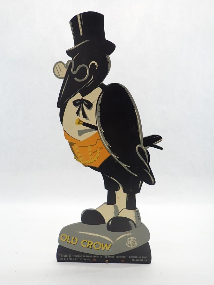 Vintage Old Crow Whiskey Wood Advertising Sign: 20.625" in height, together with an Old Crow napkin Holder
