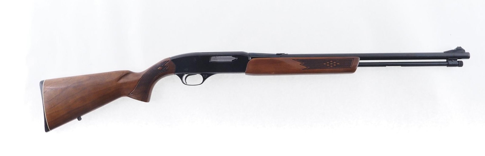 Winchester Model 275 Rifle: SN: 750163 Year of Mfg: 1965-1971 Cal: .22 Mag Action Type: Slide Action Barrel Length: 20" Sights/Optics: Original open sights, rear sight has been cut off Stock: Original wood stock