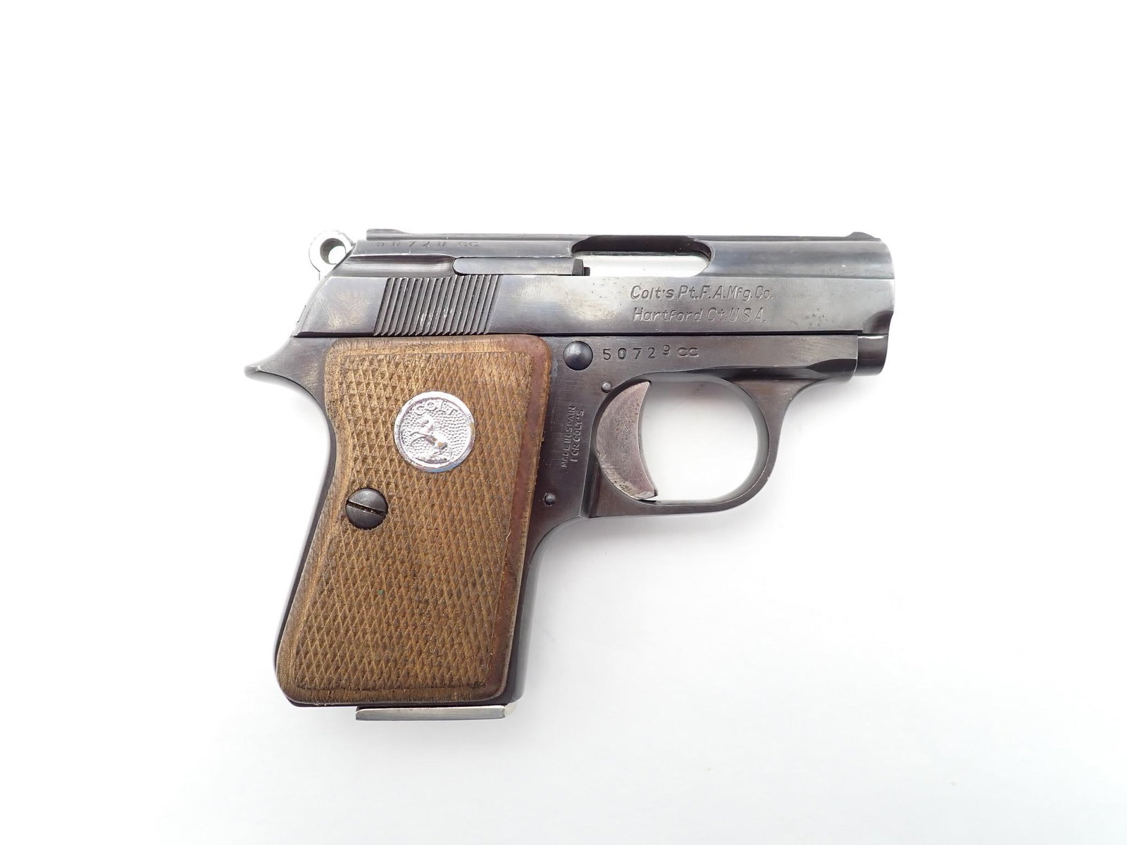 Colt Junior Colt Pistol: SN: 50729CC Year of Mfg: 1965 Cal: .22 Short Action Type: Semi Auto Barrel Length: 2.25" Sights/Optics: Original Sights Stock: Factory wood grips Finish: Blued Finish Cond: Original Bore: Very Good