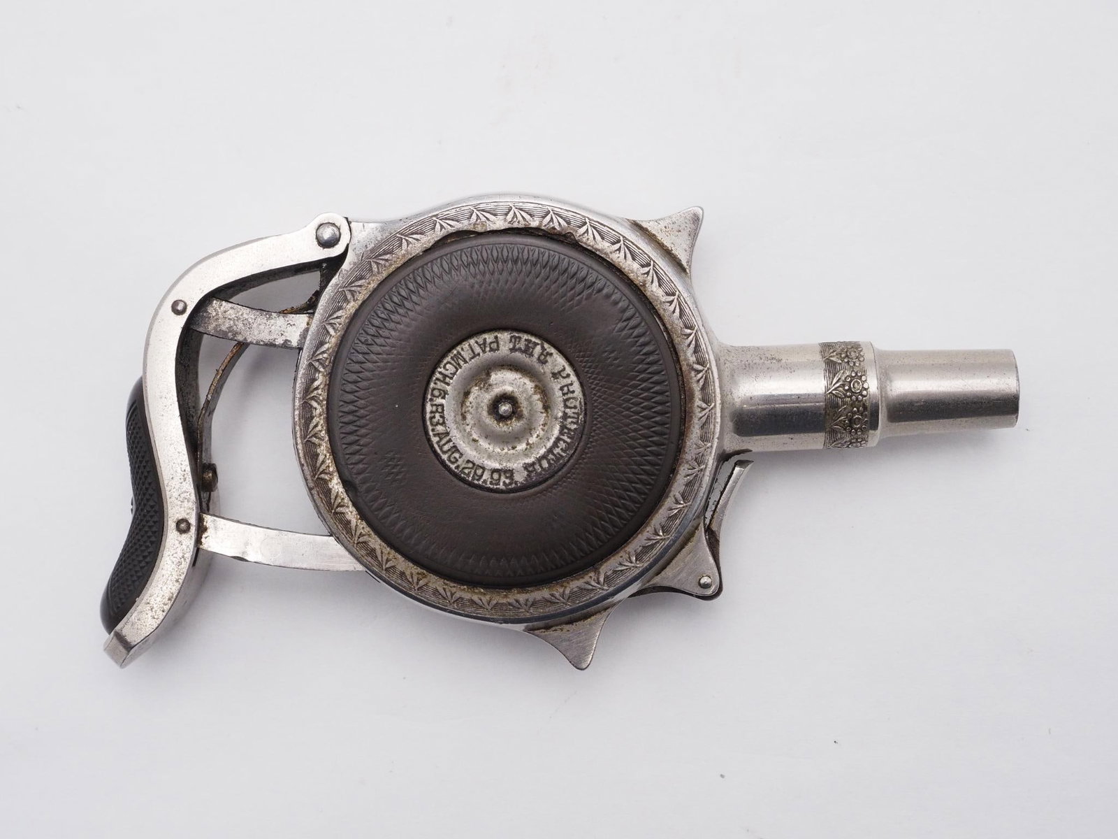 Chicago Firearms Company Protector Revolver: SN: 8909 Cal: .32 Rimfire Markings: Side Plate marked "Chicago Firearms Company" and "The Protector" Barrel Length: 1.75" Stock: Original grips Finish: Nickel Finish Cond: Original Bore: Poor Overall