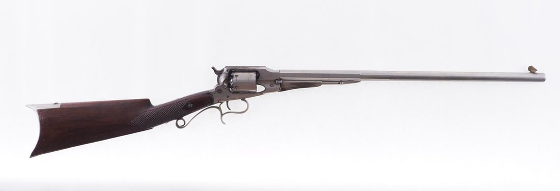 G.B. Maynard Percussion Revolving Rifle: Cal: 0.32 Action Type: Revolver Barrel Length: 20.5" Sights/Optics: Original open sights Stock: Original wood stock, small chips on wrists Finish: Coin finish Finish Cond: Poor-good