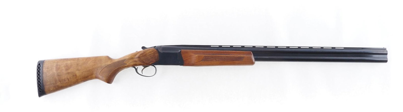 Remington SPR 310 Shotgun: SN: 052762005R Year of Mfg: 2005 Cal: 12 Ga. Action Type: Over Under Markings: Barrel marked "12 Ga.. 2 3/4" or 3" Barrel Length: 28.5" full choke (bottom) and modified (top) Sights/Optics: Vented