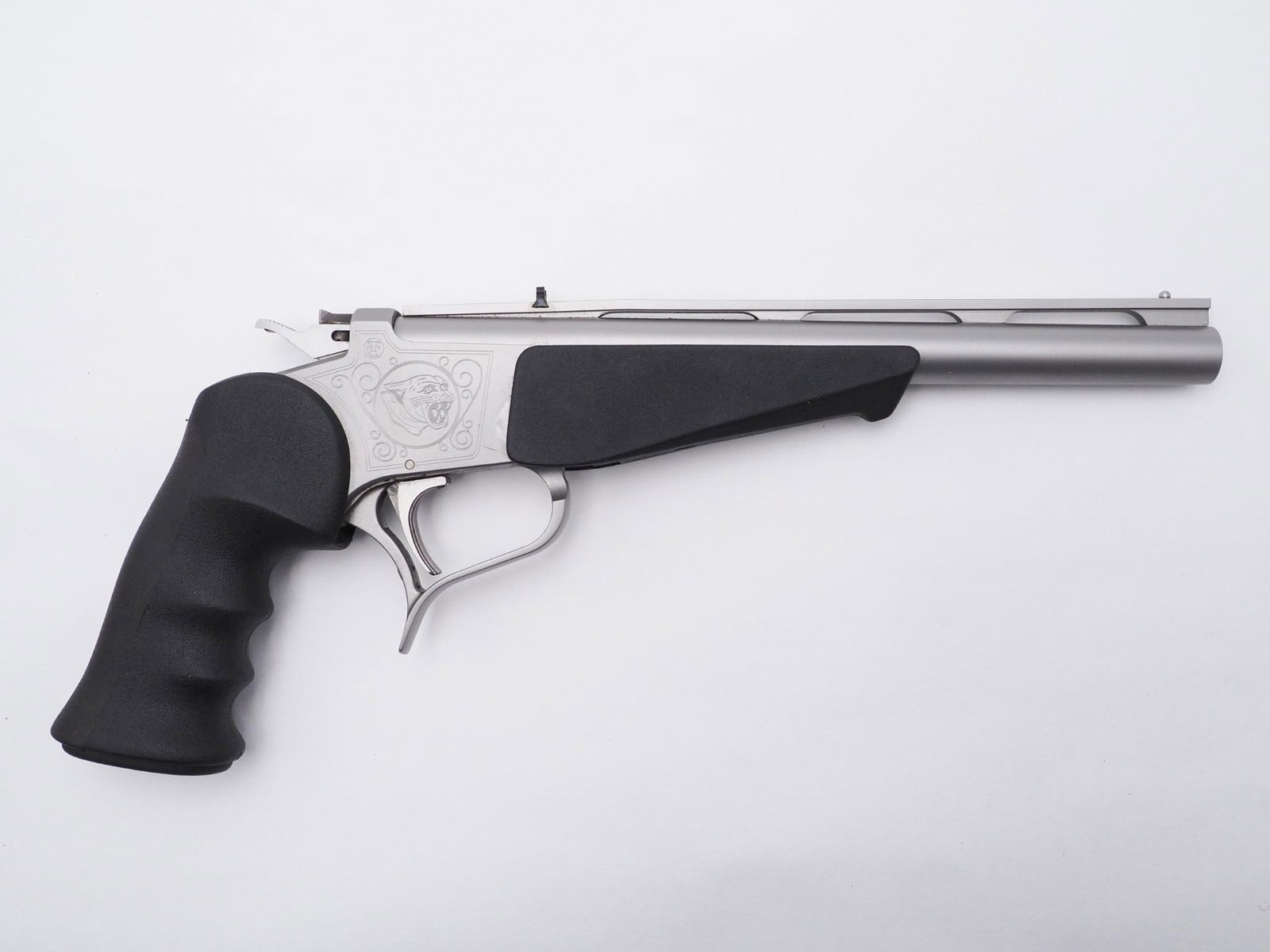 Thompson Center Contender Pistol: SN: S43501 Cal: .45 LC / 410 Action Type: Single Shot Barrel Length: 10" Vented rib Sights/Optics: Factory Sights Stock: Rubber grips Finish: Stainless Finish Cond: Orignal, excellent condition Bore: