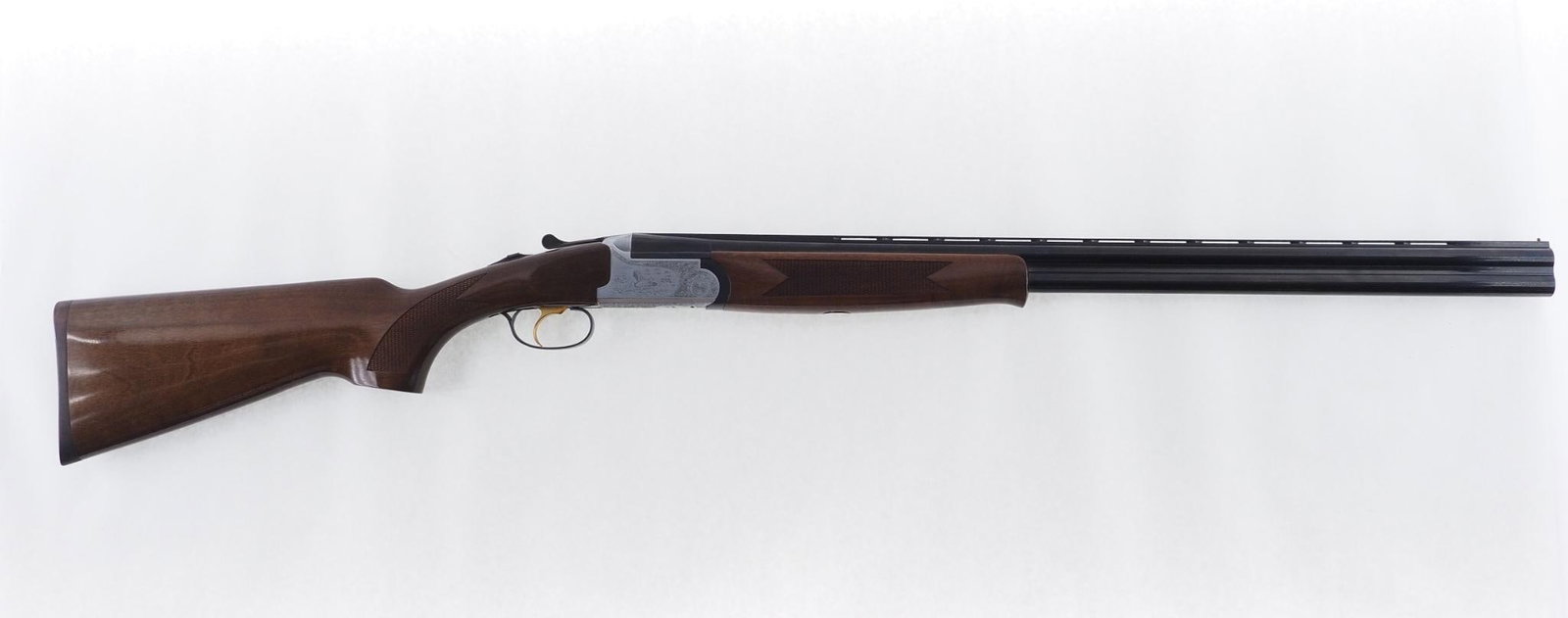 Verona LX 502 Shotgun: SN: 182398 Cal: 20 Ga. Action Type: Over Under Markings: Barrel marked "ECC Boulder City NV - Made in Italy" Barrel Length: 28" upper barrel full, lower is modified choke Sights/Optics: Vented Rib