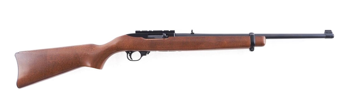Ruger 10/22 Carbine Rifle: SN: 255-88924 Cal: .22 LR Action Type: Semi Auto Barrel Length: 18.5" Sights/Optics: Original open sights Stock: Original wood stock Finish: Blued, polished bolt Finish Cond: Original, like new Bore: