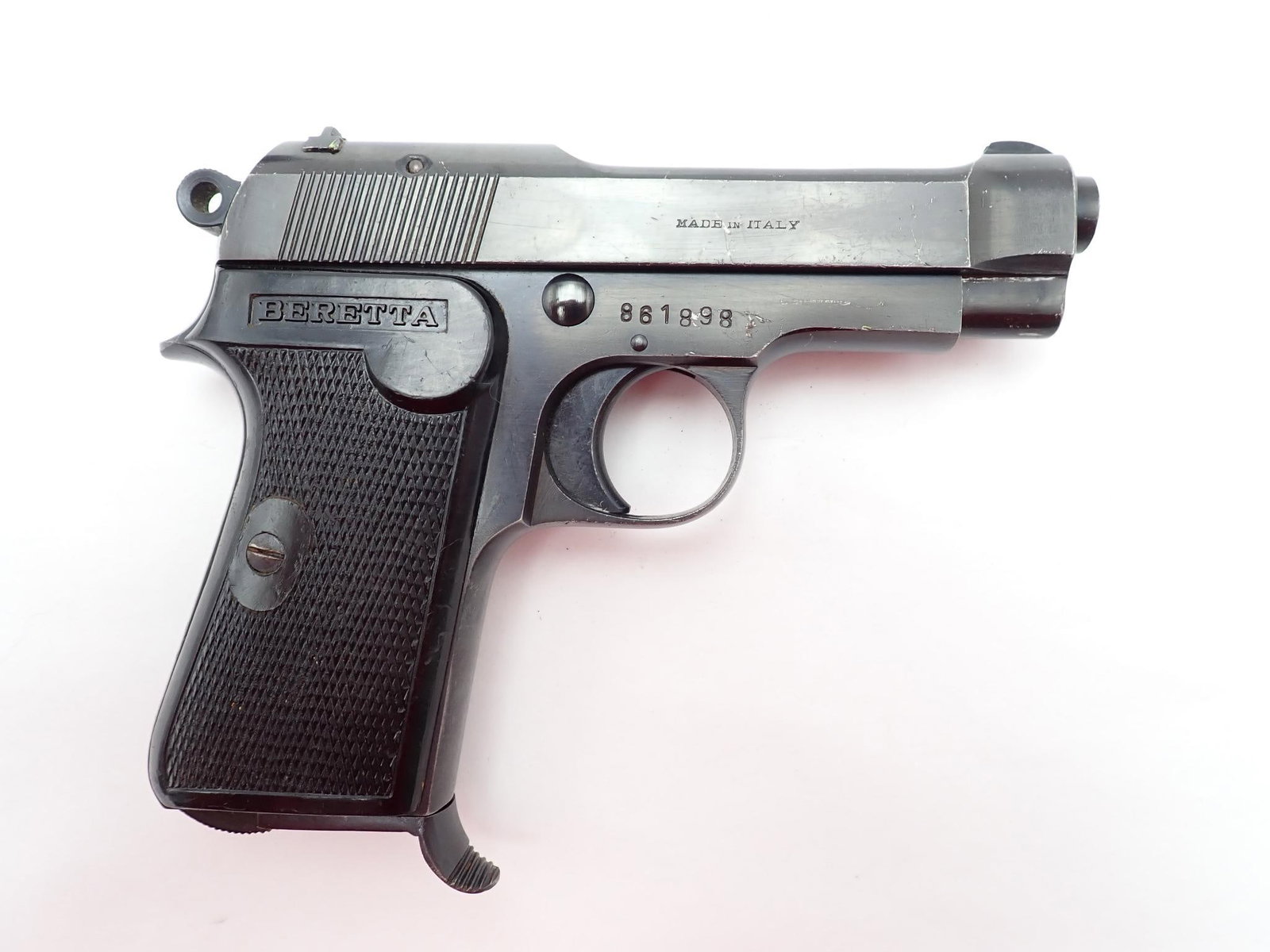 Beretta 1934 Pistol: SN: 861898 Year of Mfg: 1930-1940 Cal: 7.65mm Action Type: Semi-Auto Barrel Length: 3.25" Sights/Optics: Original open sights Stock: Hard black plastic Finish: Blued Finish Cond: Original Bore: Very