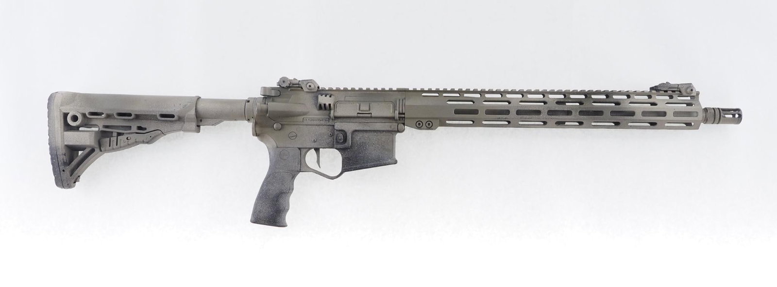 ET Arms Omega 15 Rifle: SN: ET00743 Cal: 5.56 Action Type: Semi Auto Barrel Length: 16" Sights/Optics: Flip up sights Stock: Polymer buttstock and pistol grip, aluminum handguard, spray painted tan Finish: Spray painted